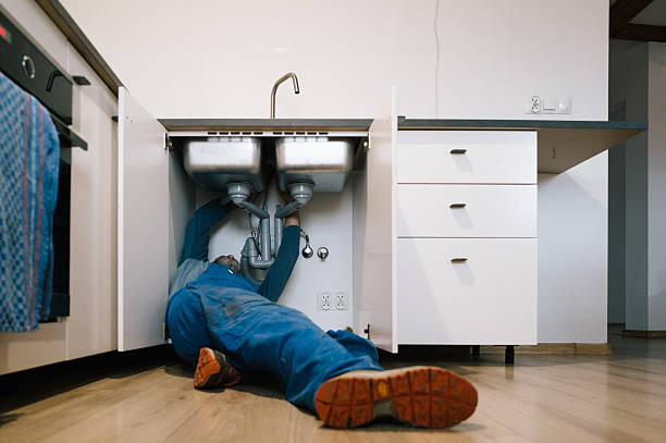 Professional Drain Cleaning technician working in Latta, OK